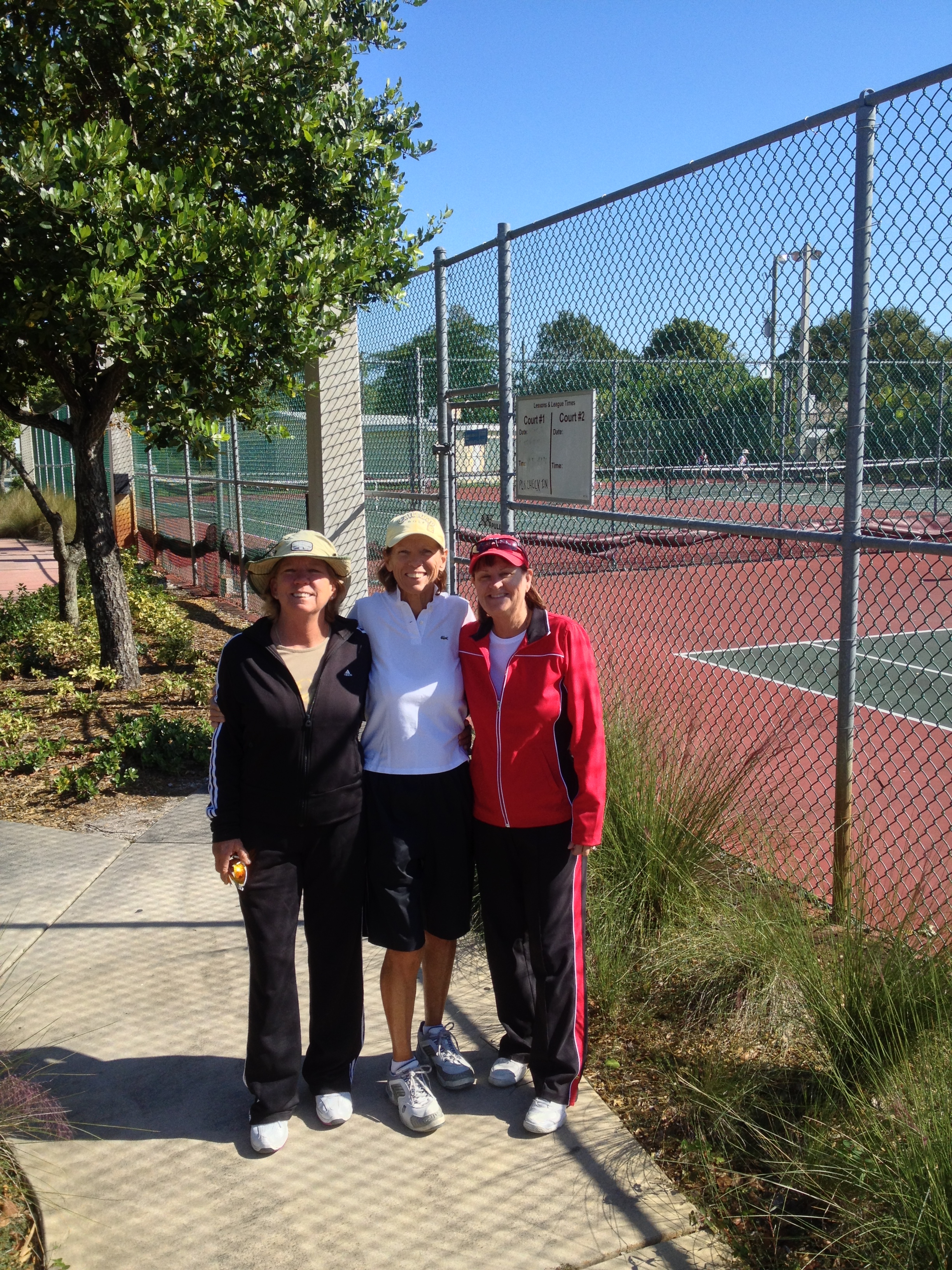 Womens tennis team and coach